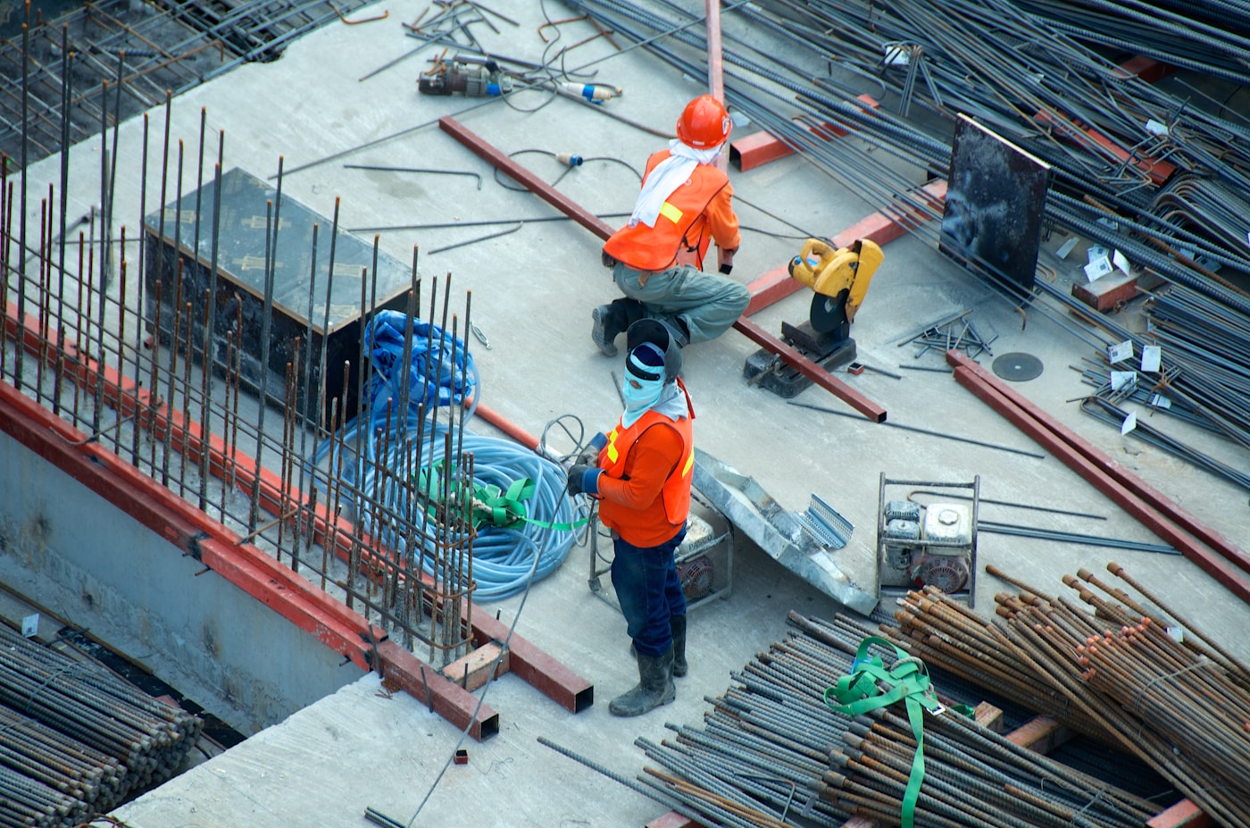 Construction workers on a building site — rising costs and Australia's housing supply